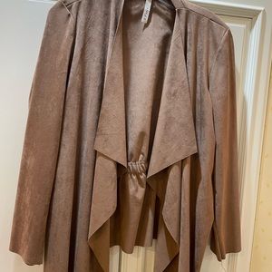 Faux suede, drape front jacket with flattering elastic back detail.